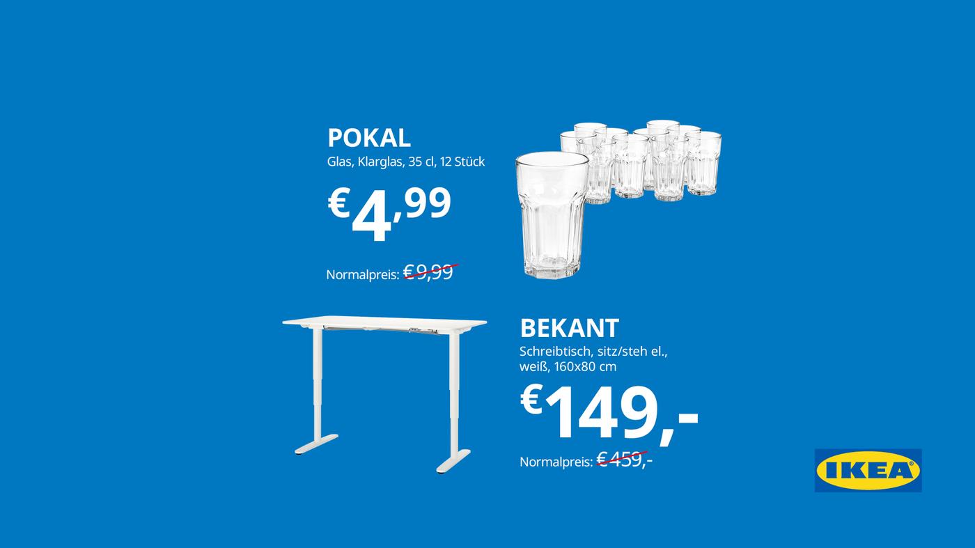 Gläser und elektrisch verstellbarer Schreibtisch