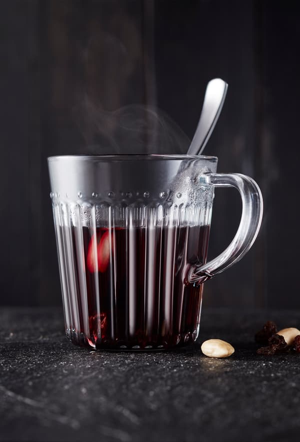 Glass cup with smoking mulled wine