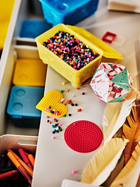 GLIS storage box in yellow with craft materials on children's desk