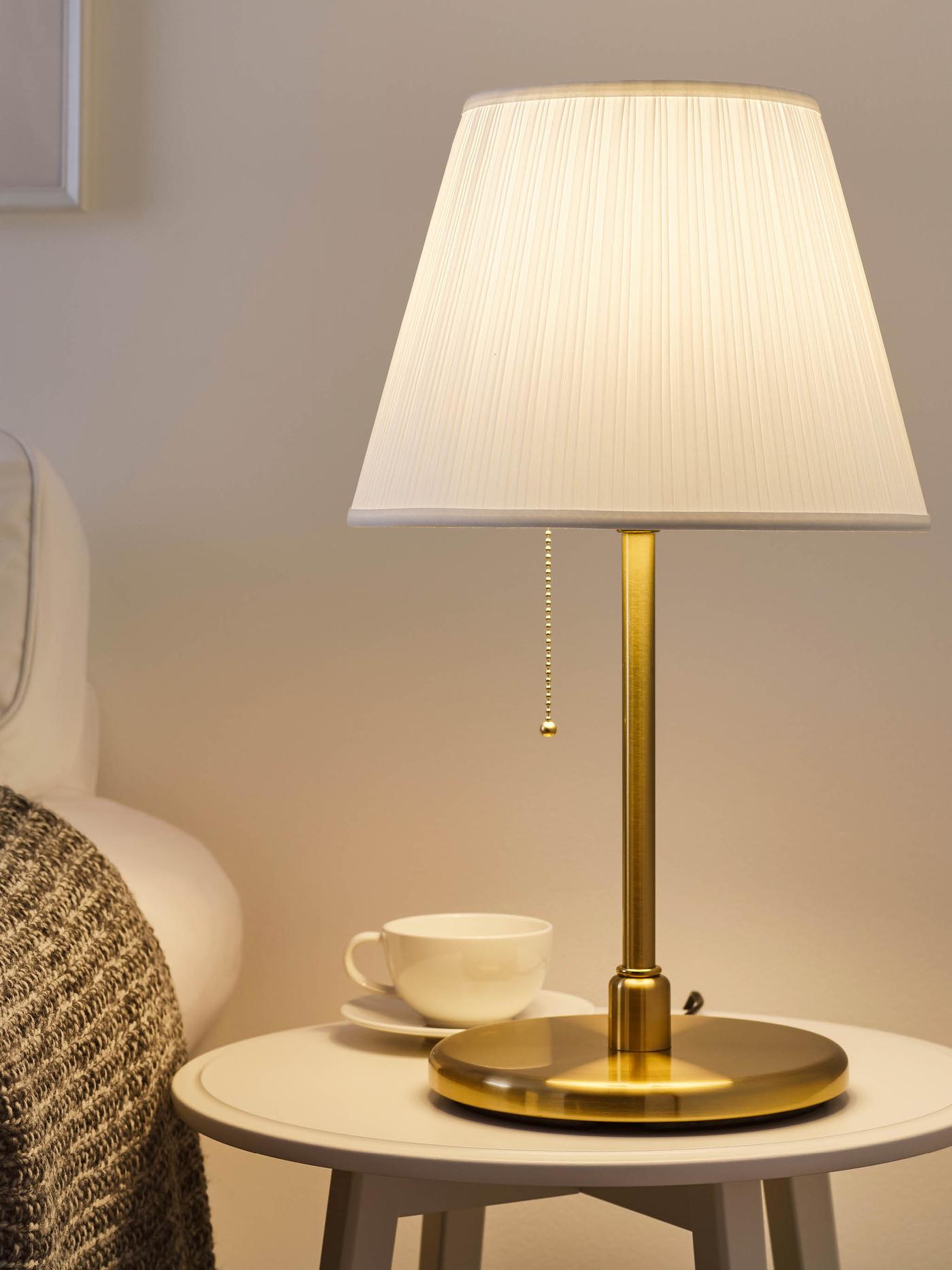 Gold lamp with white shade
