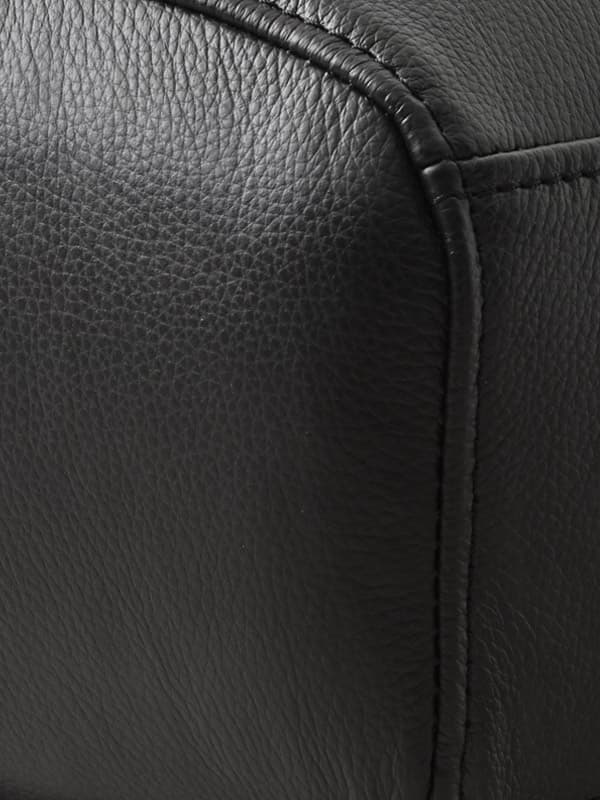 Grann/Bomstad sofabetræk i navrlæder og tekstil med belægning.