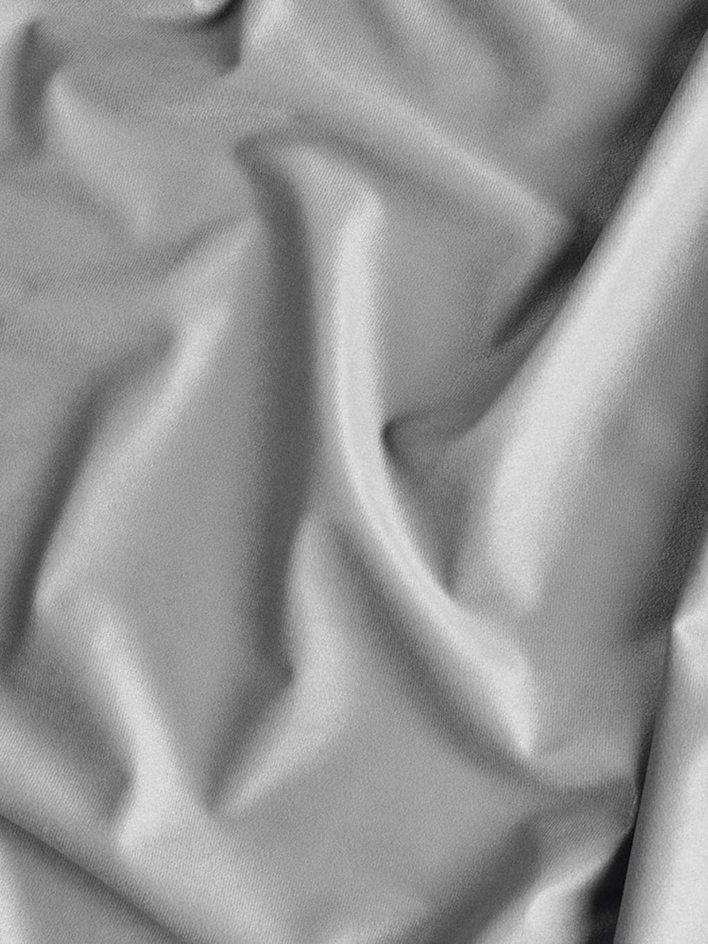 Gray curtain fabric close-up.
