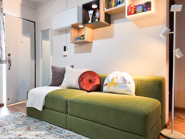 Green 2-seater JÄTTEBO modular sofa in a 3-room HDB flat in Singapore, designed by IKEA Home design service
