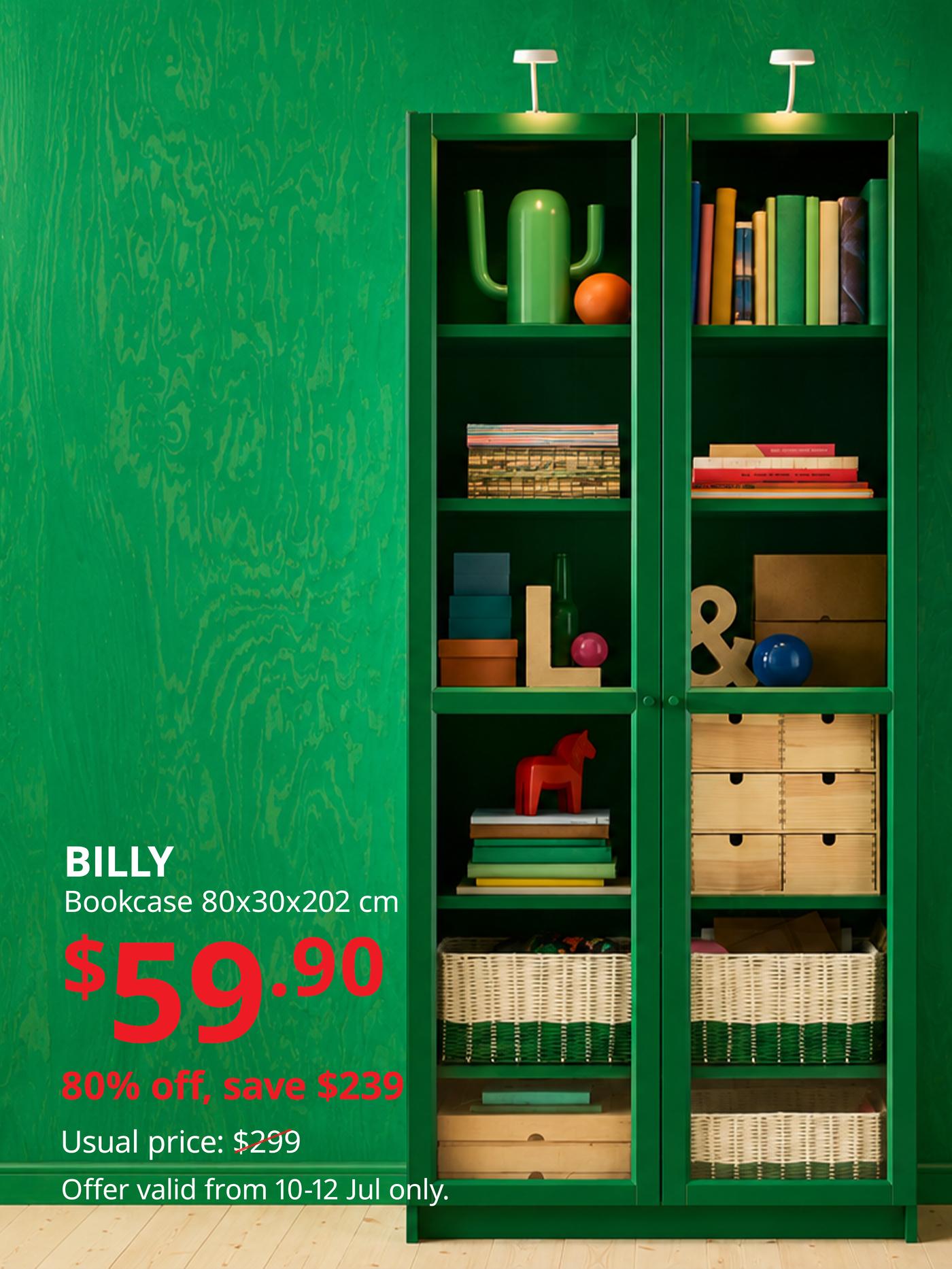 Green BILLY bookcase styled with books, storage boxes and decorative accessories.