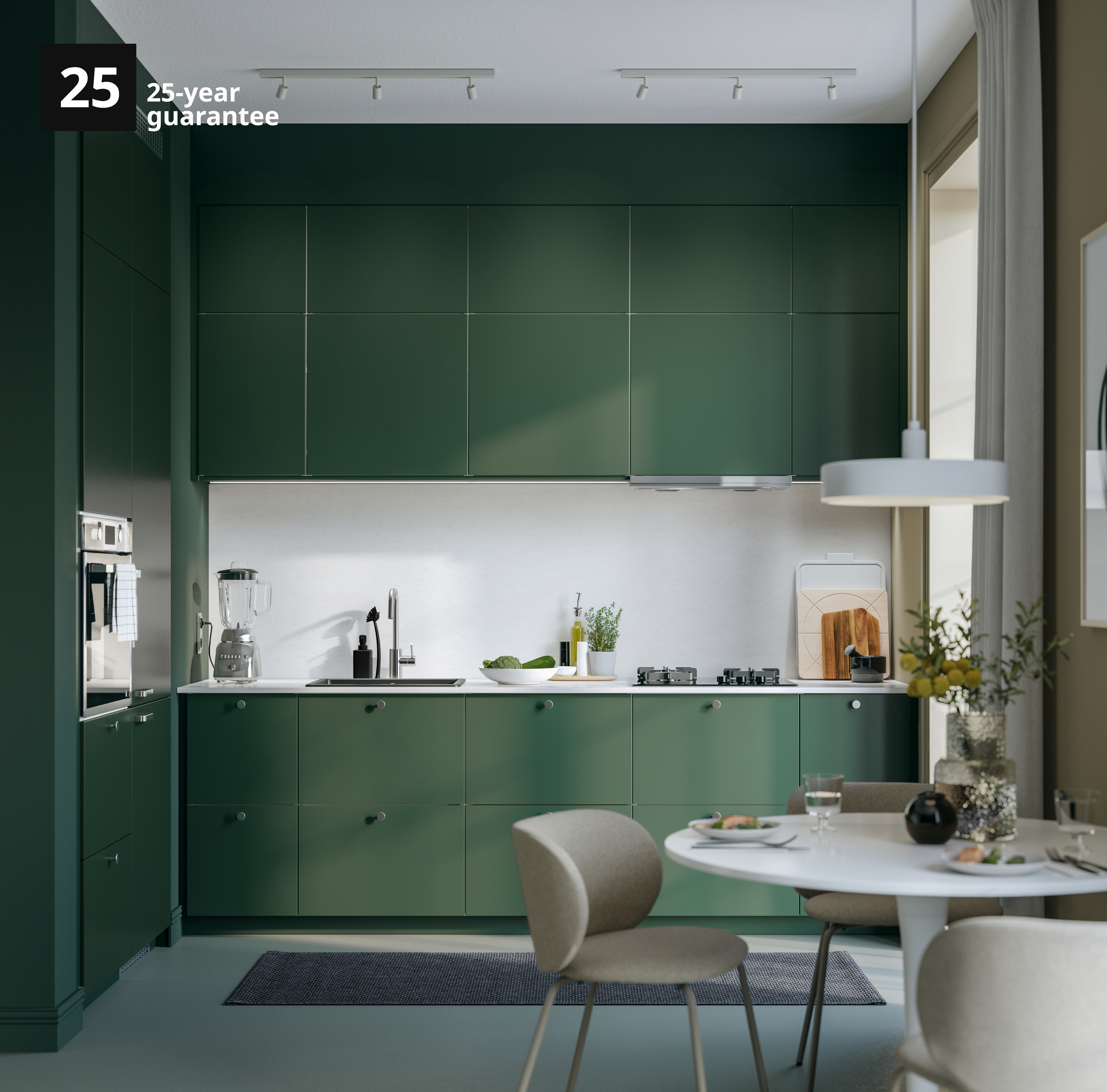 Green METOD kitchen with 25-year guarantee text