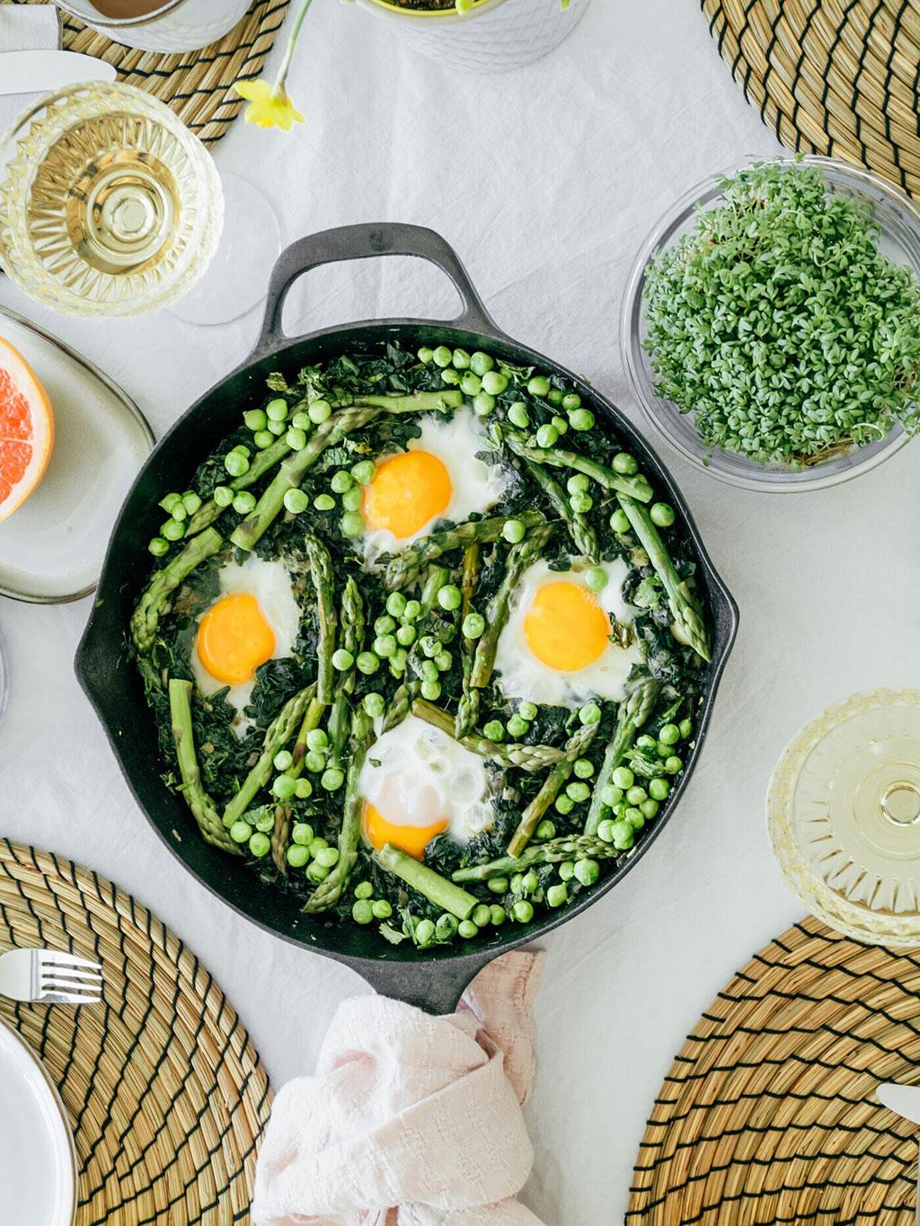 Green shakshuka with fresh eggs