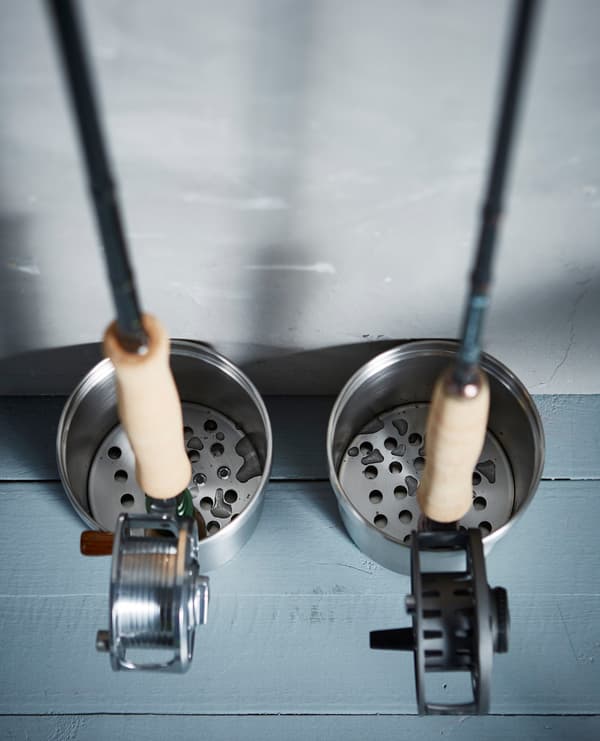 GRUNDTAL containers holding fishing rods.