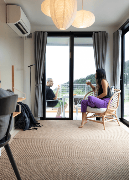 Guests chatting and relaxing in their room 