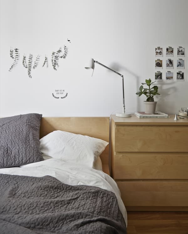 Hang soothing eucalyptus over the bed.