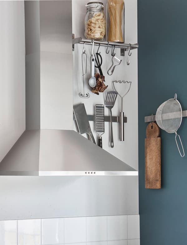 Help use your kitchen’s awkward spaces, with the help of magnetic rails and racks on the walls.