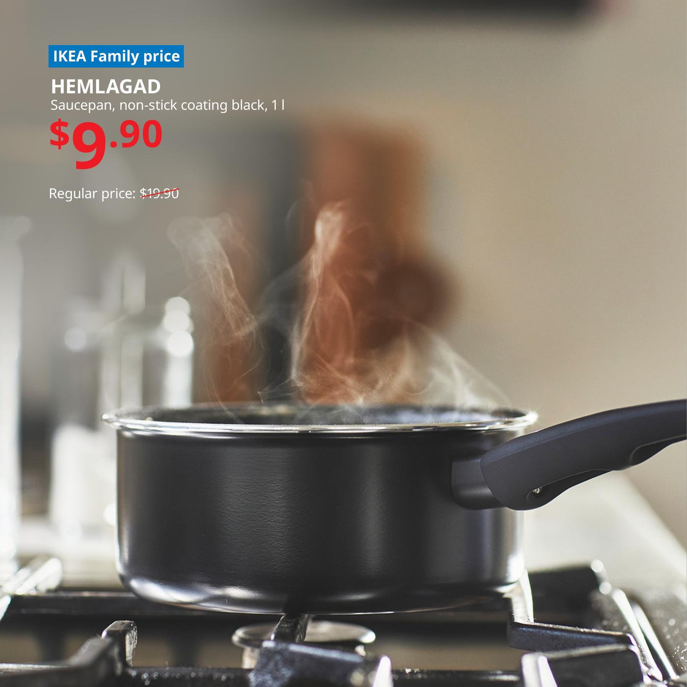 HEMLAGAD saucepan on a gas stove in the kitchen, with fumes above it. Words on image read "IKEA Family price, HEMLAGAD, Saucepan, non-stick coating black, 1 l, $9.90, Regular price: $19.90"