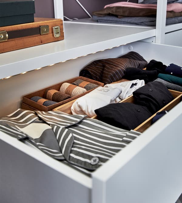 Hide underwear in handy drawers with lights so you can differentiate between blacks and blues.