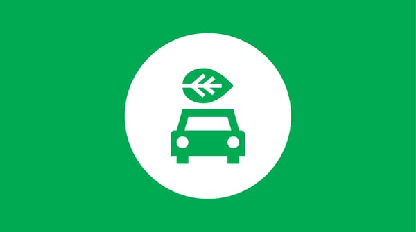 Icon of a car with a leaf on top of it, on green background. 