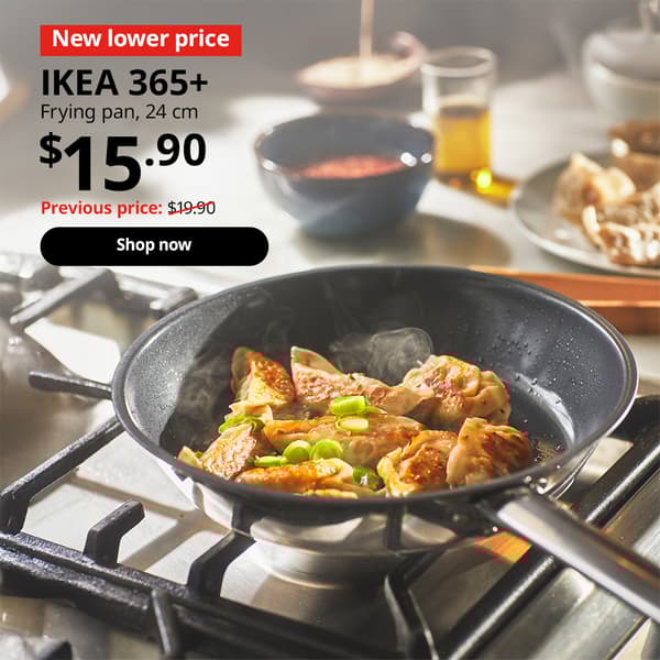 IKEA 365+ frying pan is being used to pan fry dumplings. Red tag with white text that reads, "New lower price". Black text overlay image on top-left that reads, "IKEA 365+, Frying pan, 24 cm. $15.90, Previous price: $19.90"