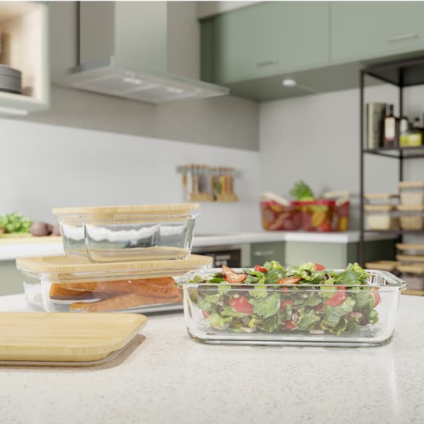 IKEA 365+ round glass food container with a tight-fitting bamboo lid keeps food fresh and preserves aromas and flavours.