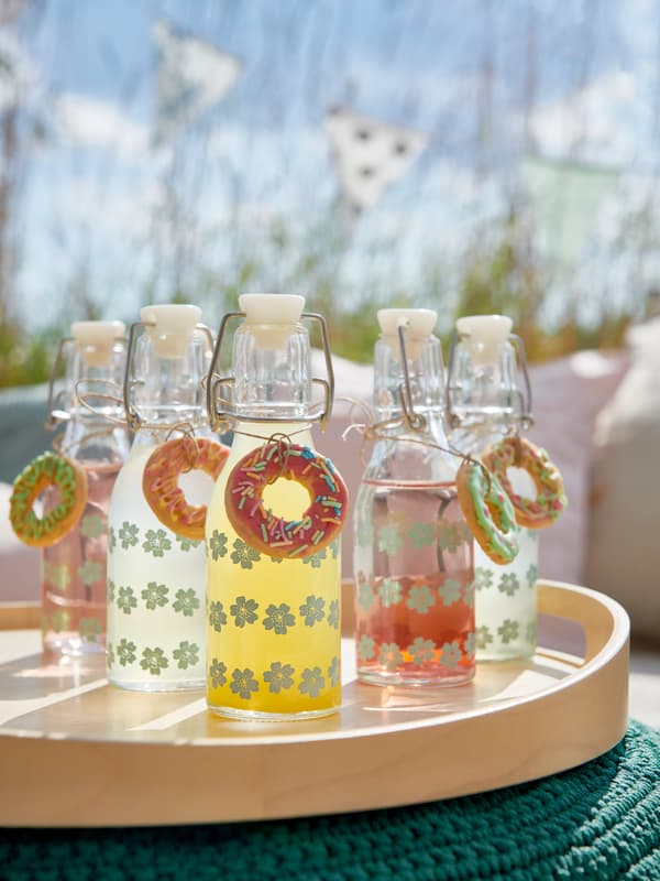 IKEA bamboo trays and glass bottles with stopper