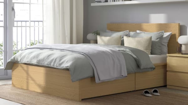 IKEA bed with storage drawers underneath 