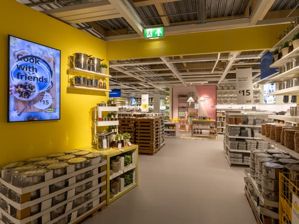 IKEA Brighton cookshop department with yellow walls.