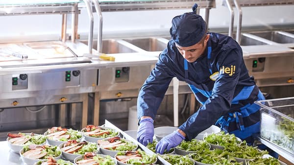 IKEA Co worker in the kitchen preparing meals
