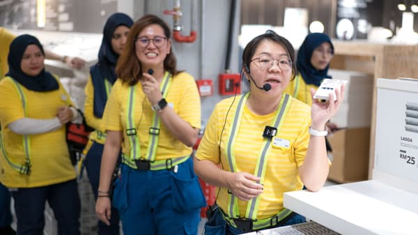 IKEA co-workers gathering for a briefing