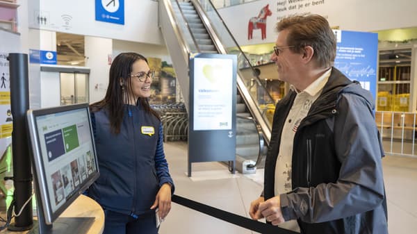 IKEA coworker helping a customer