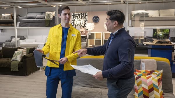IKEA coworker helping a customer
