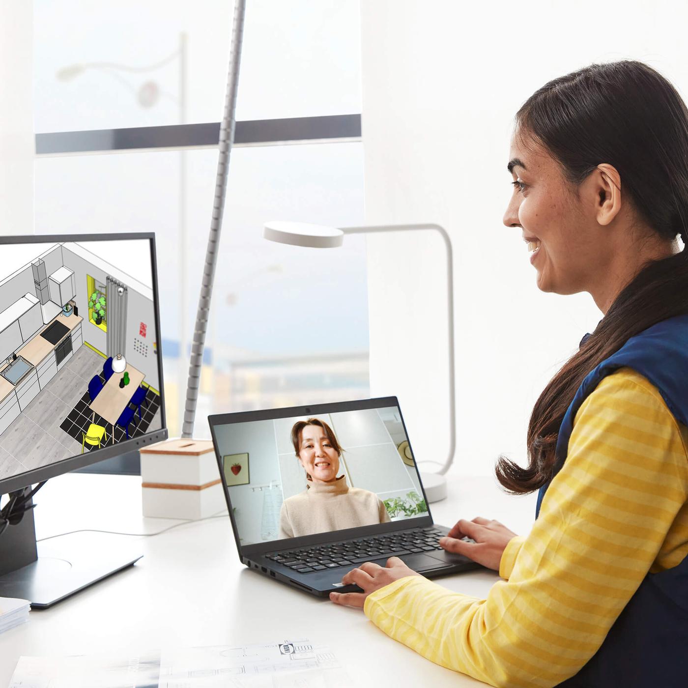 IKEA coworker on computer