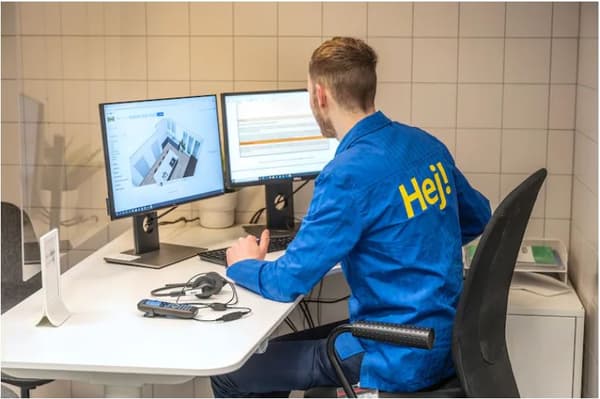 ikea coworker working on his computer 