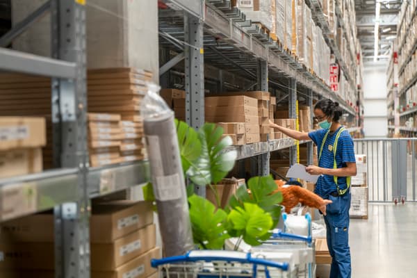 IKEA coworkers help customers to pick their items