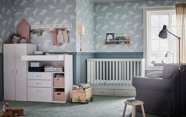 IKEA EKTORP large grey armchair with grey LEN nursing pillow in a nursery roomset.