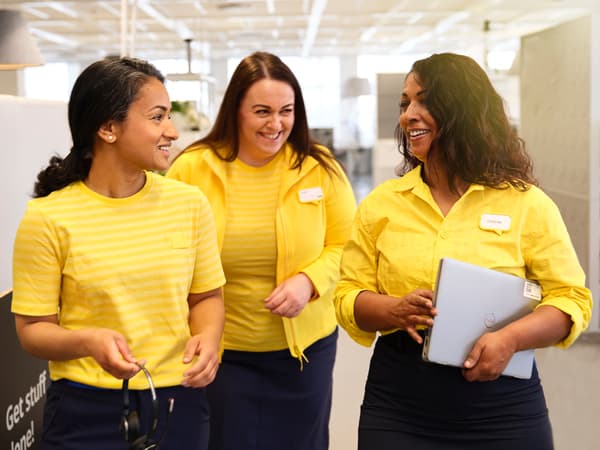 IKEA employees standing next to each other.
