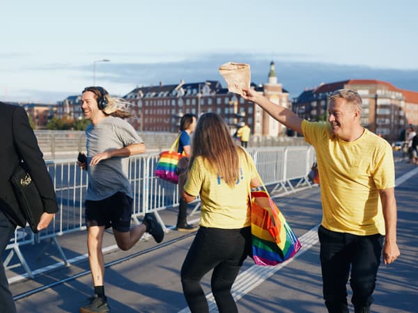 IKEA employees with FRAKTA bag