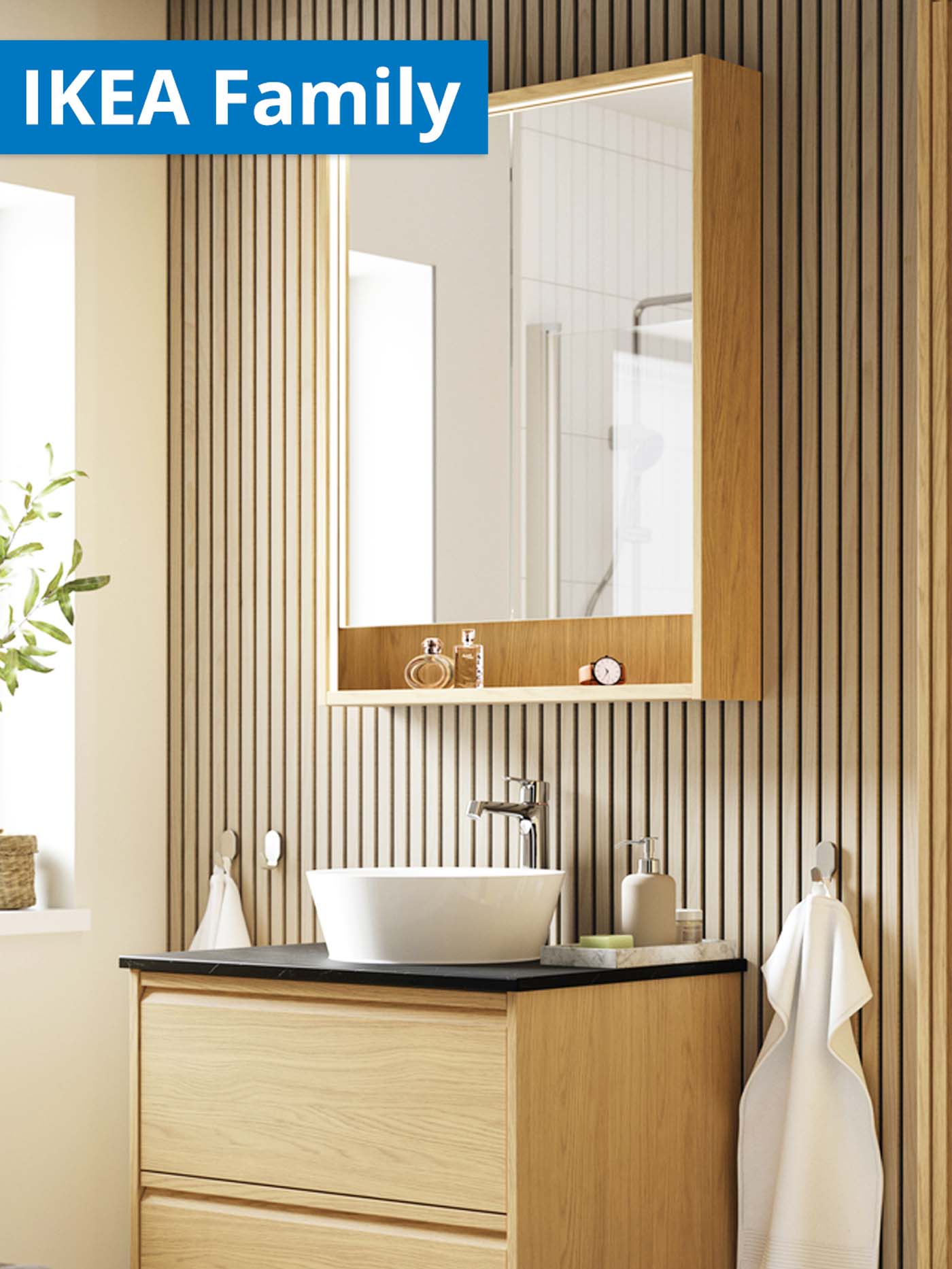 IKEA Family offers for Chinese New Year. White oak stained ENHET vanity bathroom cabinet and bathroom sink in bathroom.