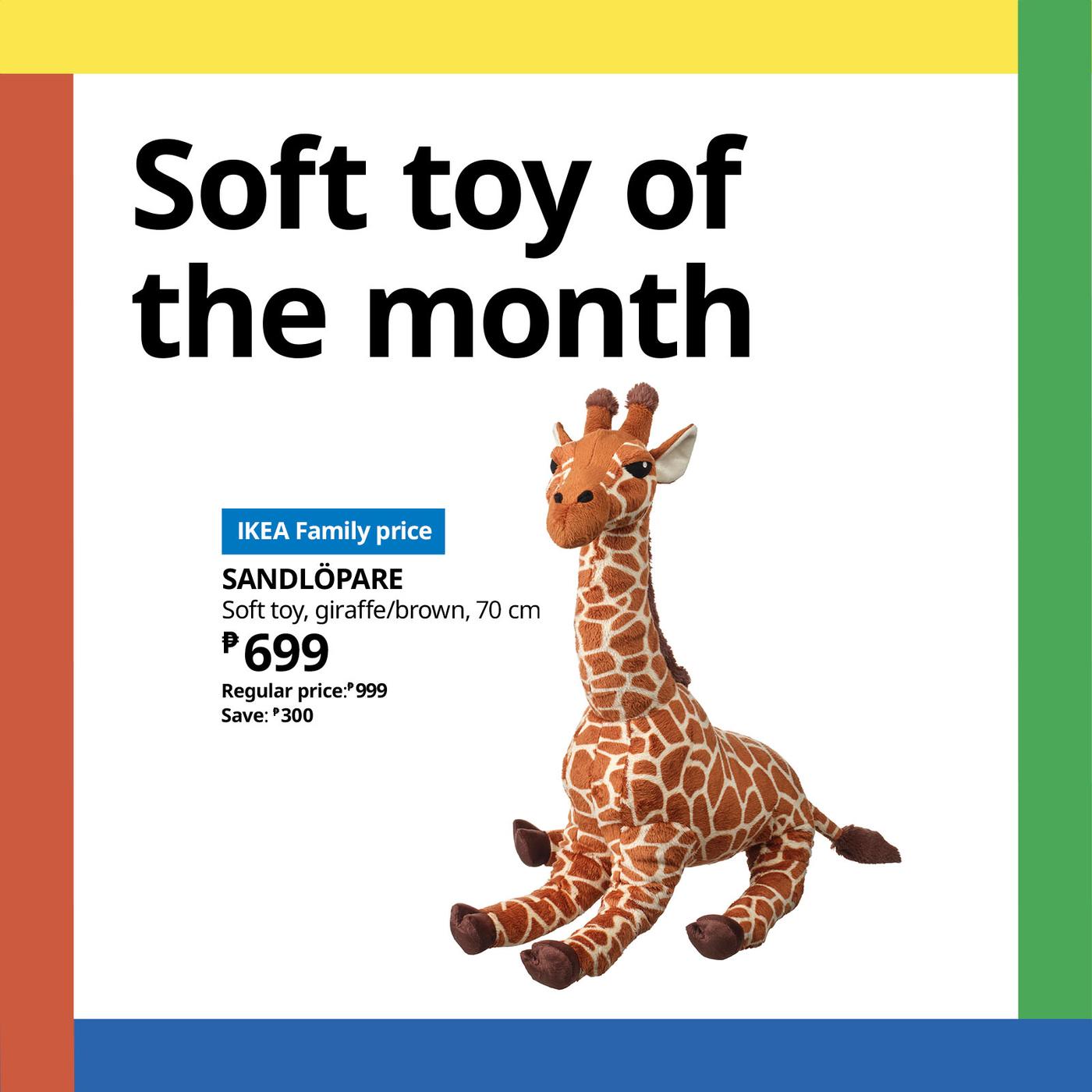 IKEA Family “Soft toy of the month” ad featuring a seated brown-and-cream stuffed giraffe, priced at ₱699, on a clean white background.