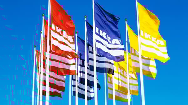 IKEA flags in different colors hurling through the air.