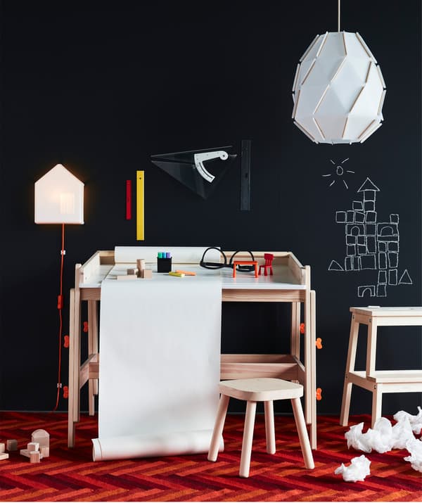 IKEA FLISAT children’s desk in wood with a built in drawing paper roll holder