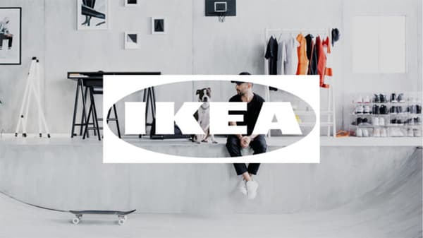 IKEA FONSTER over sitting man and a skateboard
