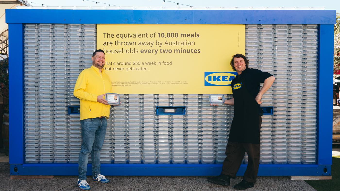 IKEA Food manager and Simon Toohey chef in front of 10,000 containers to encourage Australians to waste less food.