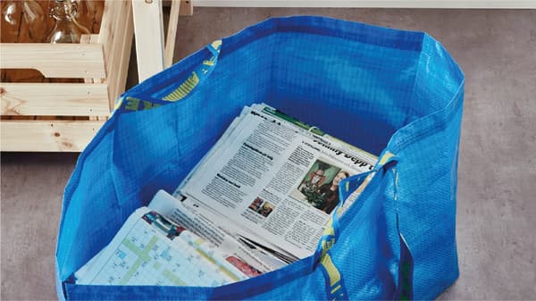 IKEA frakta bag filled with news paper
