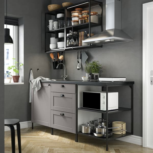 IKEA grey shaker ENHET kitchen and dark worktop with a grey wall and wood floor