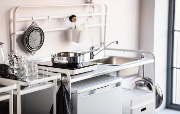 IKEA has a wide range of budget-friendly kitchen furniture. SUNNERSTA mini-kitchen in white is a compact unit and a great solution if you are looking for a fully-functional kitchen. It’s airy, spacious, and easy to put up and take down yourself.