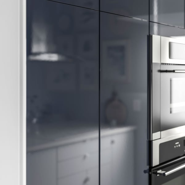 IKEA JÄRSTA black blue front cabinet doors closeup.