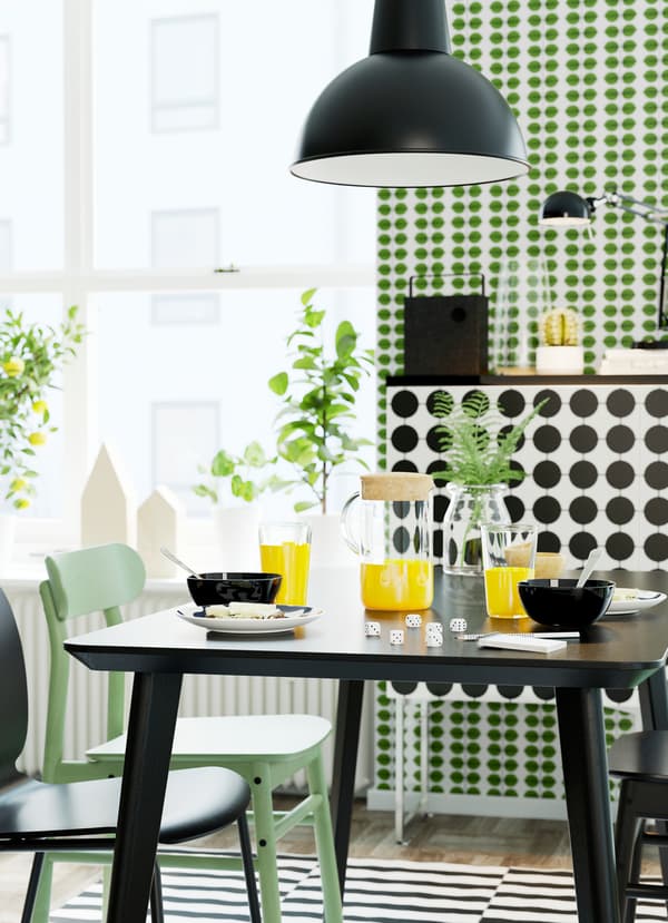 IKEA LISABO light ash veneer dining table, green and RÖNNINGE chairs and SVENBERTIL black chairs.