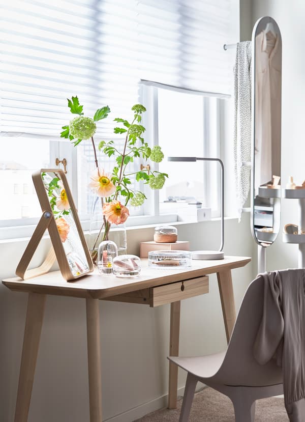 IKEA LISABO light ash veneer table, ODGER beige white plastic chair and SAMMANHANG glass domes for perfumes.