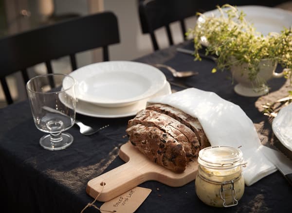 IKEA PROPPMÄTT beech chopping board doubles as a rustic serving tray while KORKEN glass jars can store homemade jams or your favourite sauces and spreads, making them reusable gift containers for foodies.