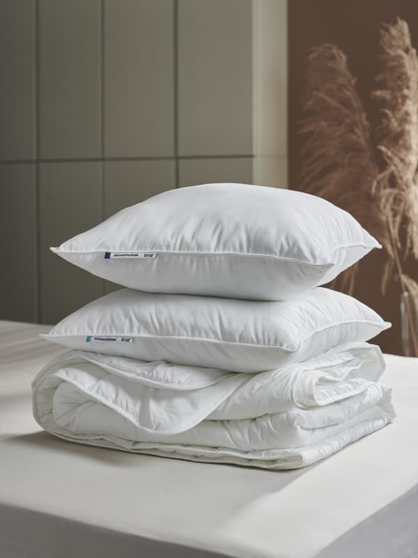 IKEA roept consumenten op oude hoofdkussens en dekbedden in te leveren