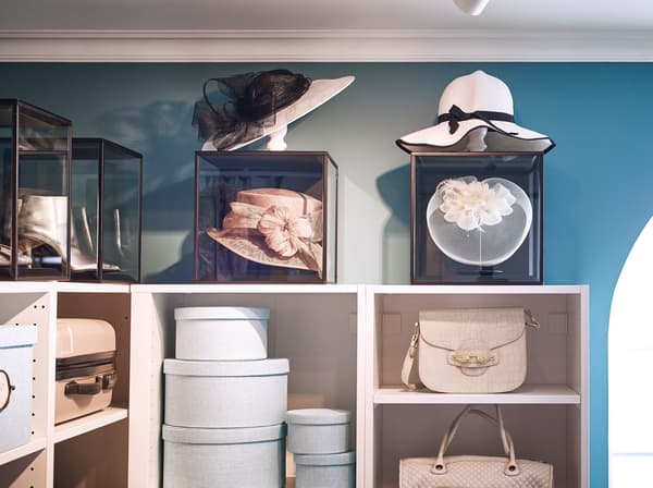 IKEA SAMMANHANG display boxes with black framed lid and clear glass sides, showing off hats.