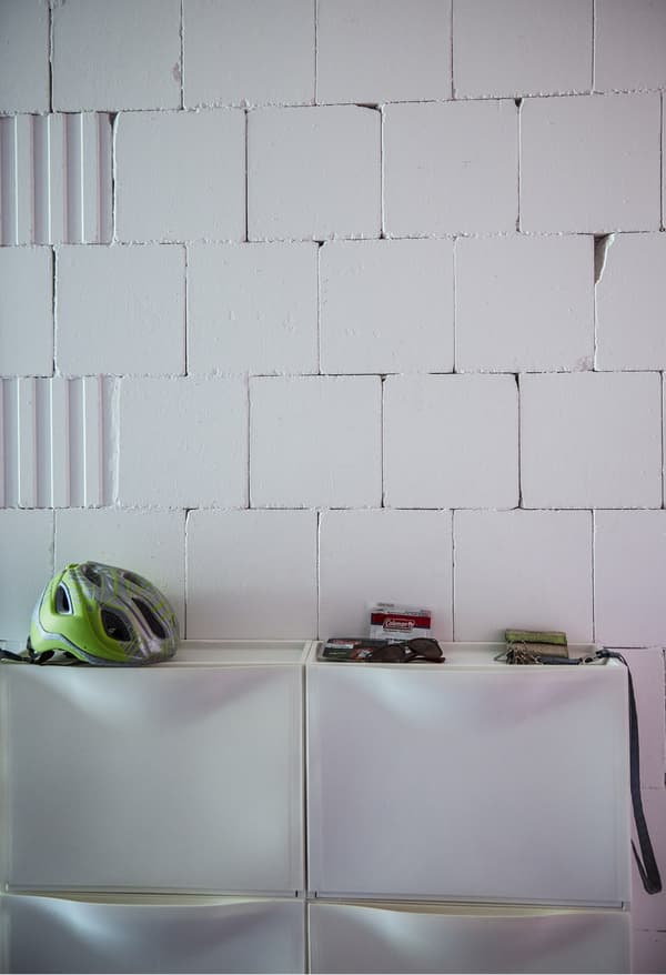 IKEA shoe cabinets on a white wall.