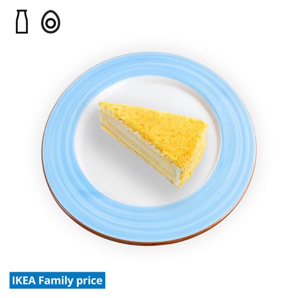 IKEA Singapore Family Food offers at Swedish Restaurant — D24 Durian cream cake on a blue/white side plate. Food allergen symbols of dairy and egg in black on the top left-hand. The IKEA Family price tag is displayed in blue and white text, positioned at the bottom left of the image.