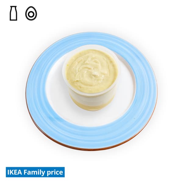 IKEA Singapore Family Food offers at Swedish Restaurant — D24 Durian mousse in a cup on a blue/white side plate. Food allergen symbols of dairy and egg in black on the top left-hand. The IKEA Family price tag is displayed in blue and white text, positioned at the bottom left of the image.